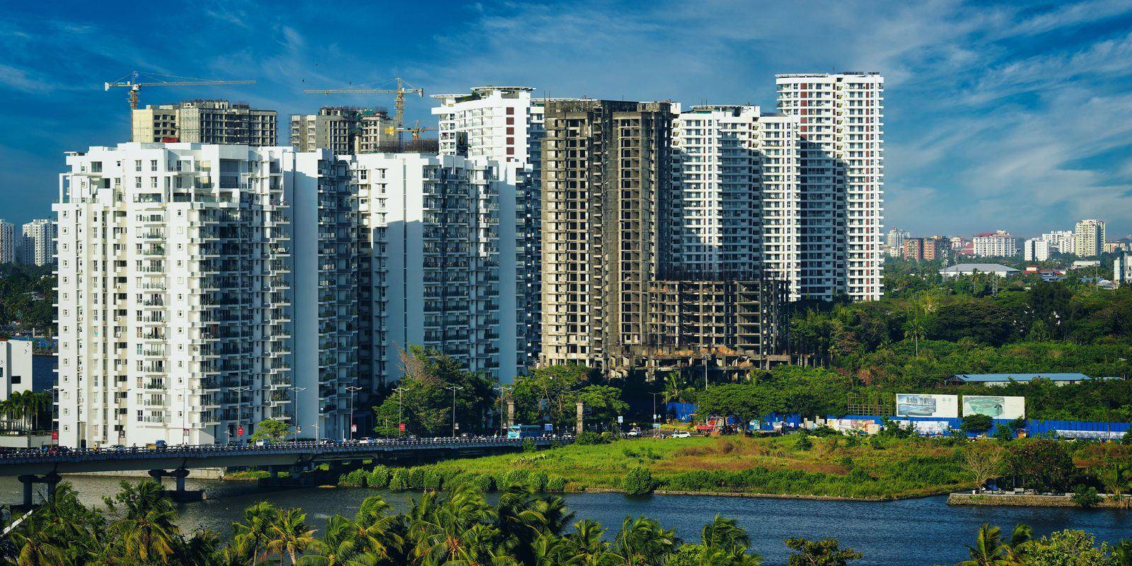 Waterfront high-rise apartments and bridge over the backwaters in Kochi, Kerala